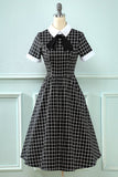 Abito vintage plaid anni '50 con fiocco