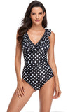 Costumi da bagno monopemo a pois neri