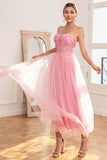 Splendido abito da ballo rosa senza spalline con applicazioni